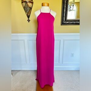 Spaghetti strap halter style flowing maxi dress with tags. Never worn. Size M.